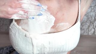 Wet and messy ice cream challenge in leather jacket and levis jeans
